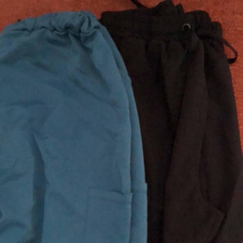 Women green and black scrub pants fairly worn